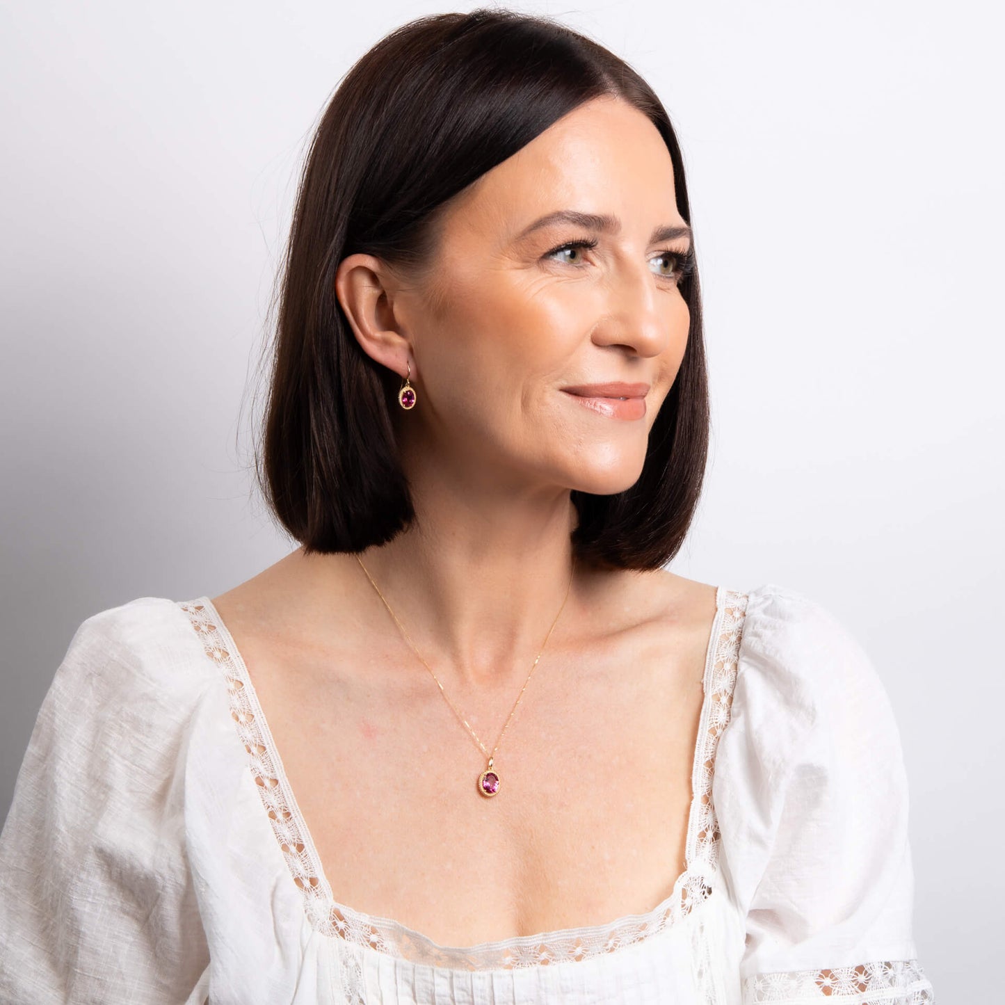 Oval Cut Pink Topaz Drop Earrings in 9ct Gold