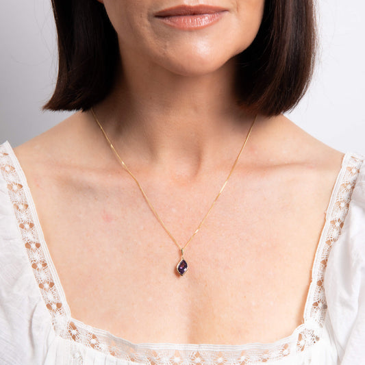 Flame Cut Amethyst Pendant in 9ct Gold
