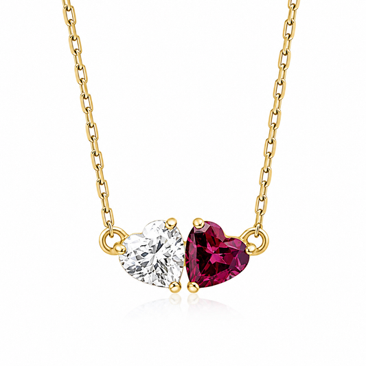 9ct yellow gold Toi et Moi necklace featuring heart-cut rhodolite garnet and white topaz on an adjustable chain.