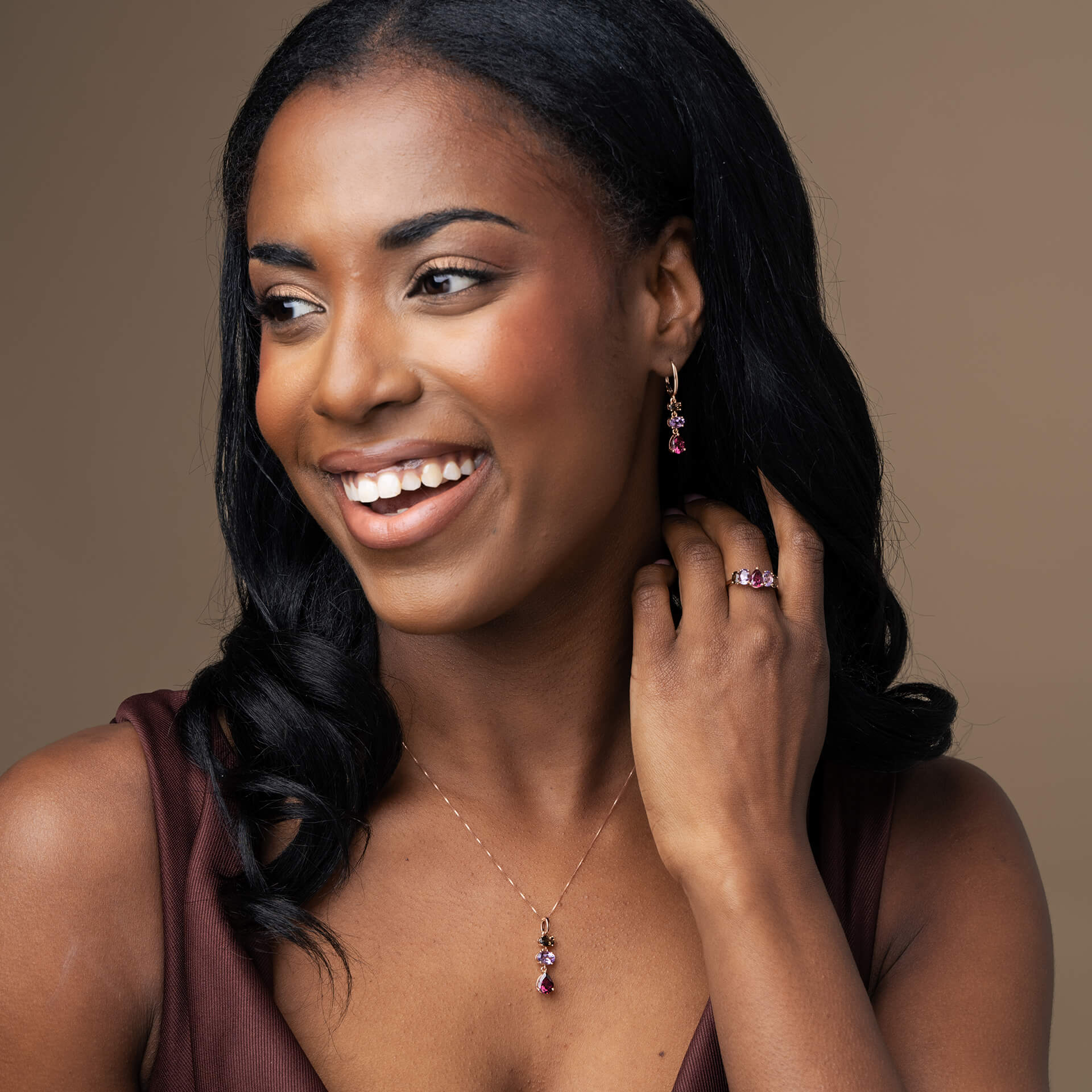 9ct rose gold drop earrings featuring natural smoky quartz, Rose de France amethyst and rhodolite garnet gemstones in a graceful graduated design with hinged hoop fittings.