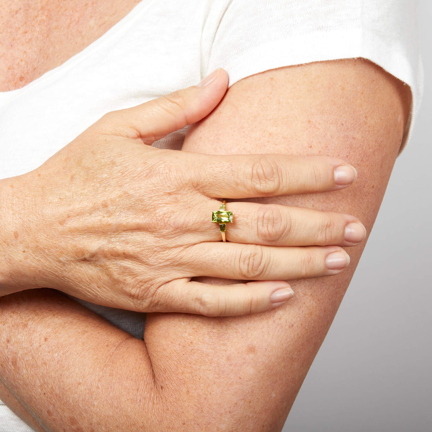 Trilogy Peridot Ring in 9ct Gold