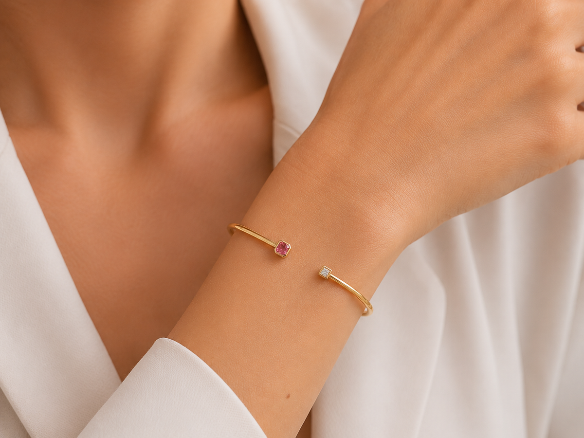 Gold flexi bangle with octagonal pink tourmaline and brilliant-cut diamond halo