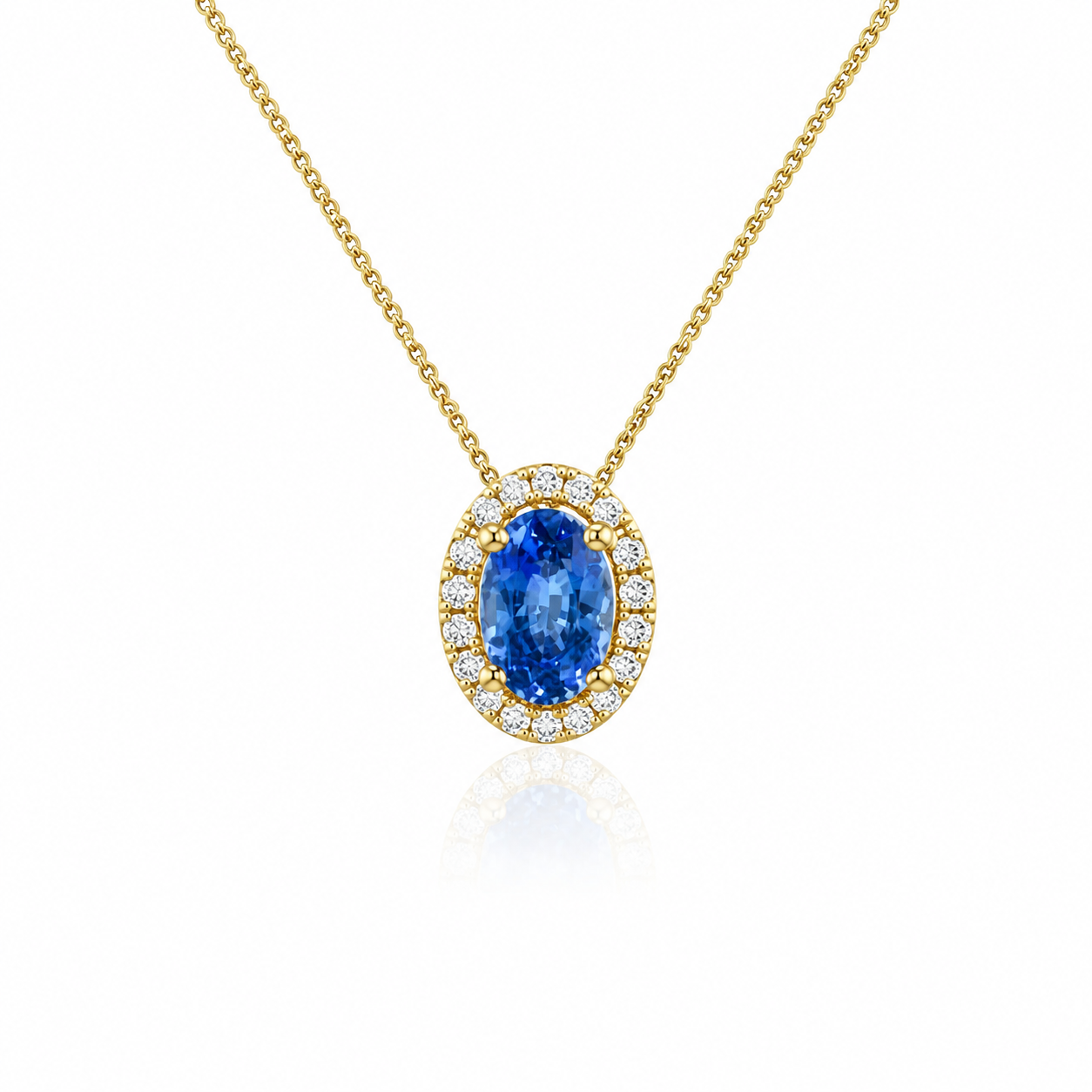 Lyra oval cornflower-blue sapphire and diamond halo pendant in 18ct yellow gold by Marcus Tempus.