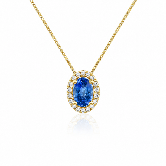 Lyra oval cornflower-blue sapphire and diamond halo pendant in 18ct yellow gold by Marcus Tempus.