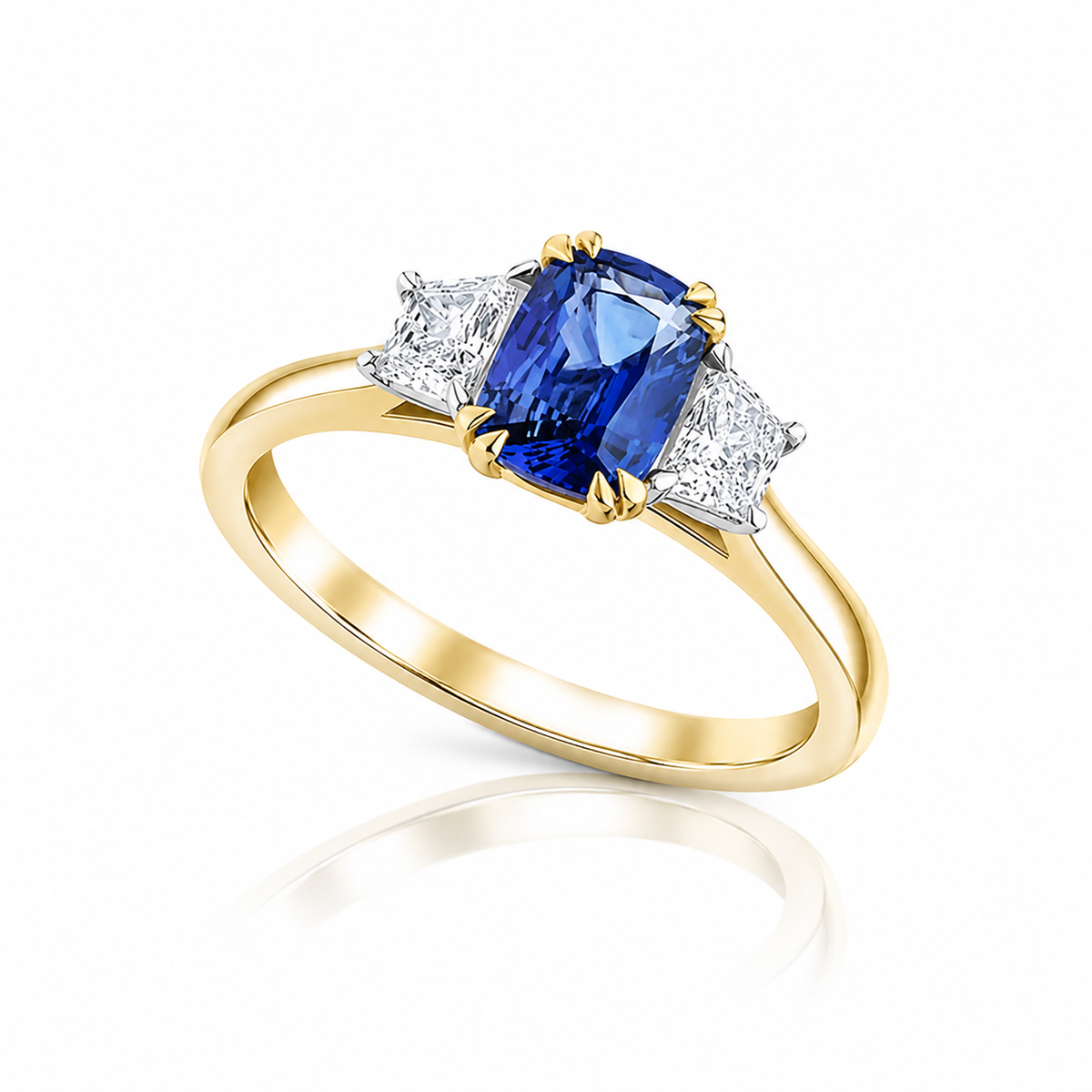 Astoria 1.00ct cushion-cut blue sapphire ring with 0.35ct trapeze diamonds in 18ct yellow gold and platinum.