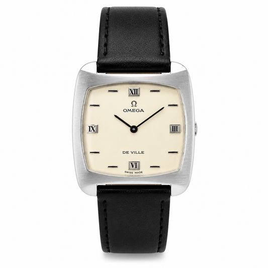 Vintage Omega De Ville stainless steel watch with silver dial, Roman numeral markers and black leather strap.