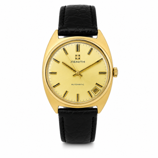 Vintage Zenith Automatic watch with gold-tone case, champagne dial, date display and black leather strap.