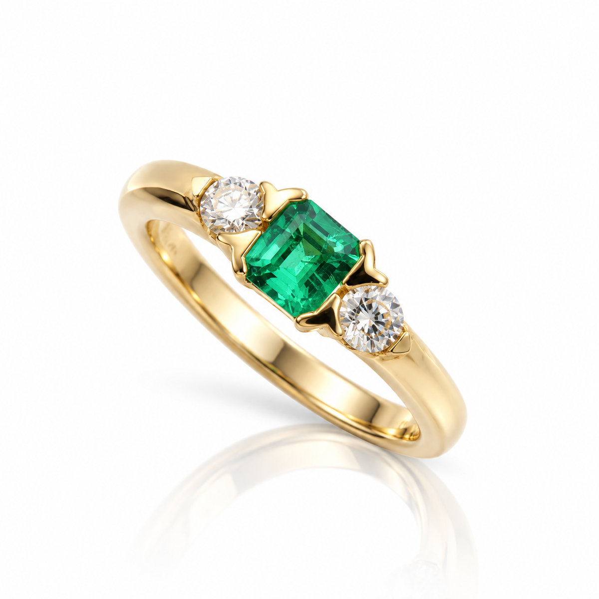 9ct yellow gold emerald-cut emerald and diamond three-stone ring