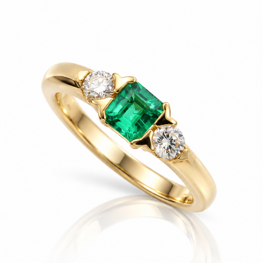 9ct yellow gold emerald-cut emerald and diamond three-stone ring