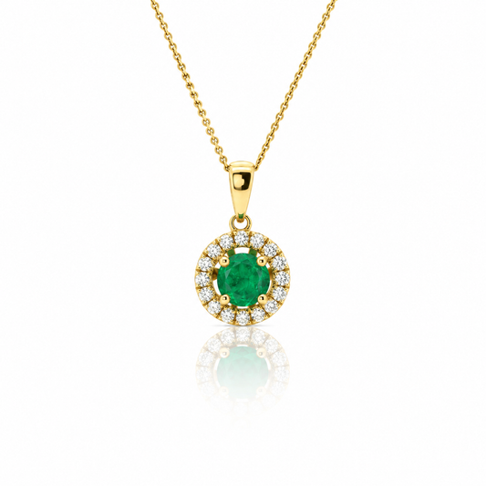 18ct gold Zambian emerald and diamond halo pendant