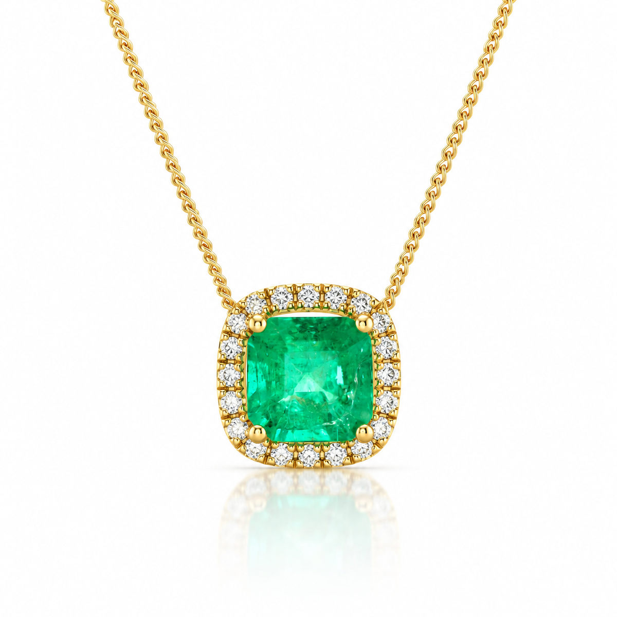 One-of-a-kind 18ct gold Zambian emerald and diamond halo pendant