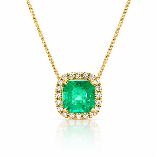 One-of-a-kind 18ct gold Zambian emerald and diamond halo pendant