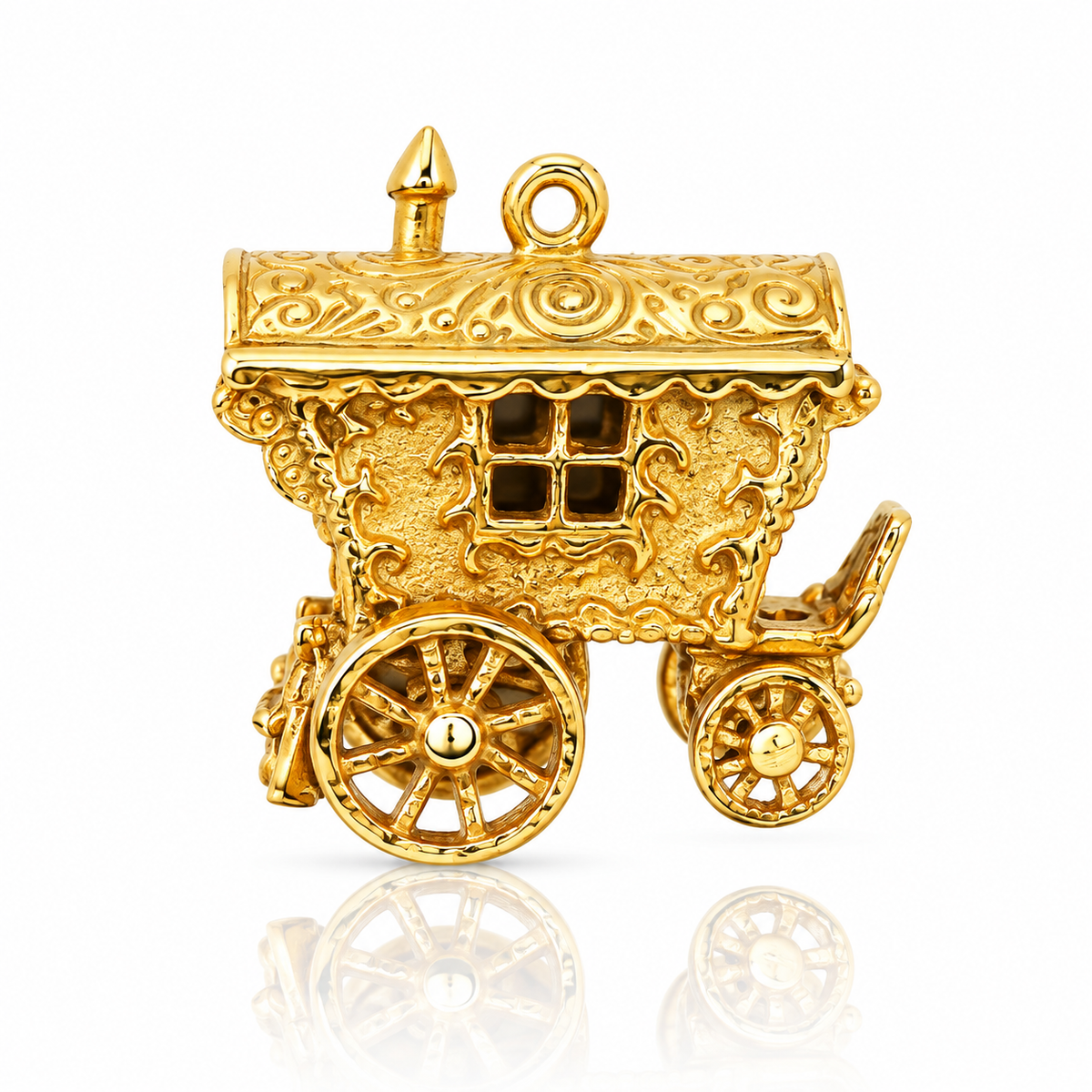 Vintage 9ct gold gypsy caravan charm with ornate detailing and spoked wheels