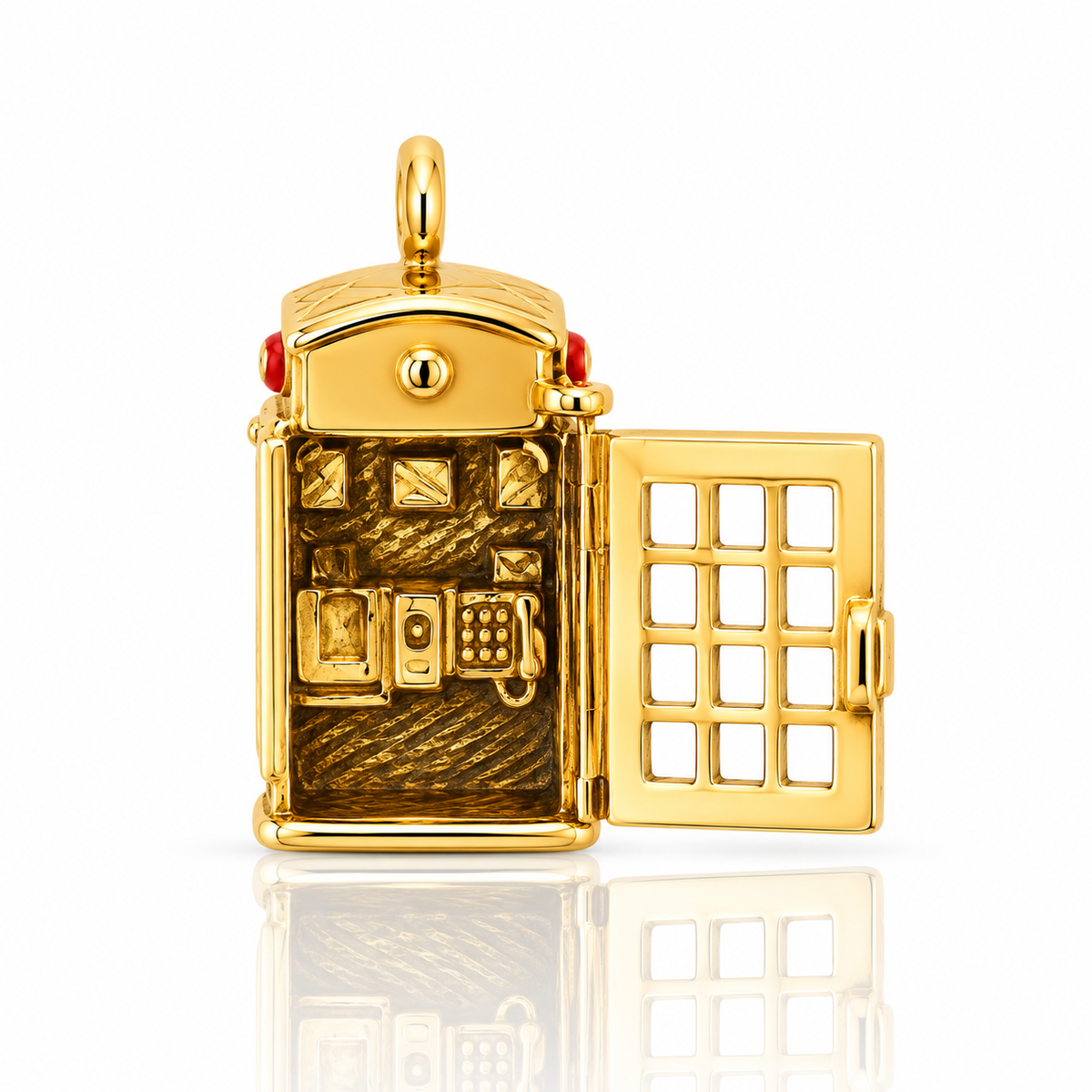 Vintage 9ct yellow gold telephone box charm with opening door and detailed interior, 15 × 8 mm.