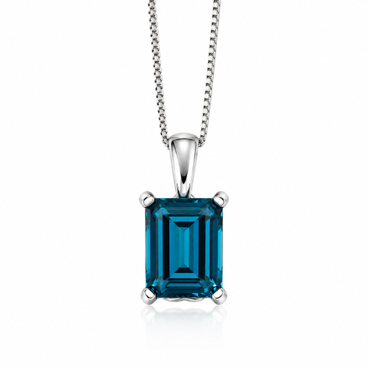 Natural rectangular blue topaz pendant in 9ct white gold with an adjustable fine curb chain.