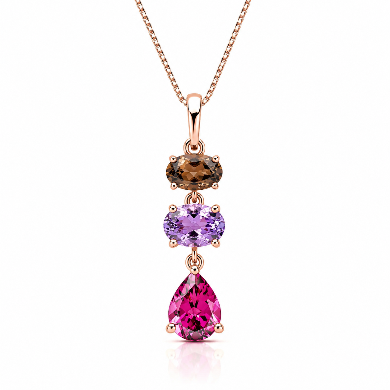9ct rose gold pendant with natural smoky quartz, Rose de France amethyst and rhodolite garnet on an adjustable 16–18 inch fine chain.