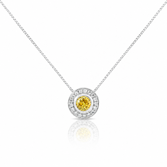 Natural fancy yellow diamond halo pendant with a golden yellow centre diamond surrounded by sparkling white diamonds.
