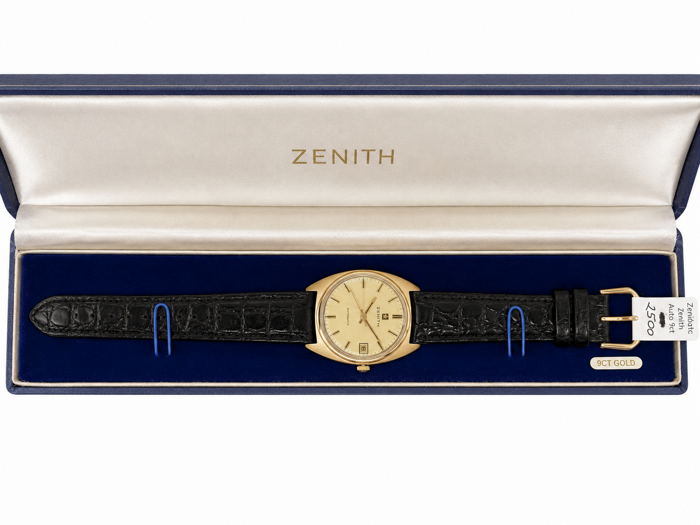 Vintage Zenith Automatic watch with gold-tone case, champagne dial, date display and black leather strap.