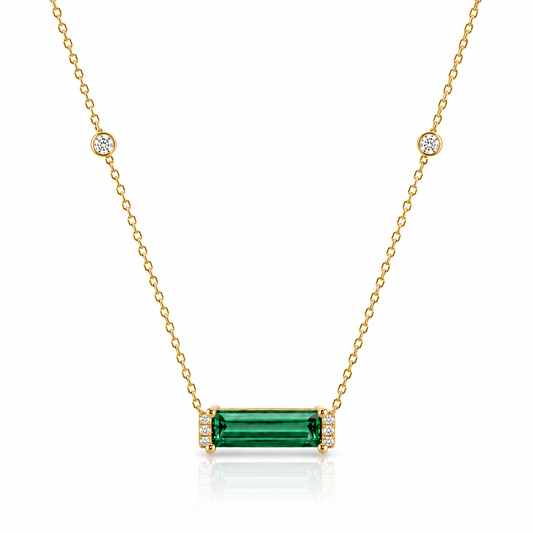 Forest green tourmaline and diamond pendant in 9ct yellow gold