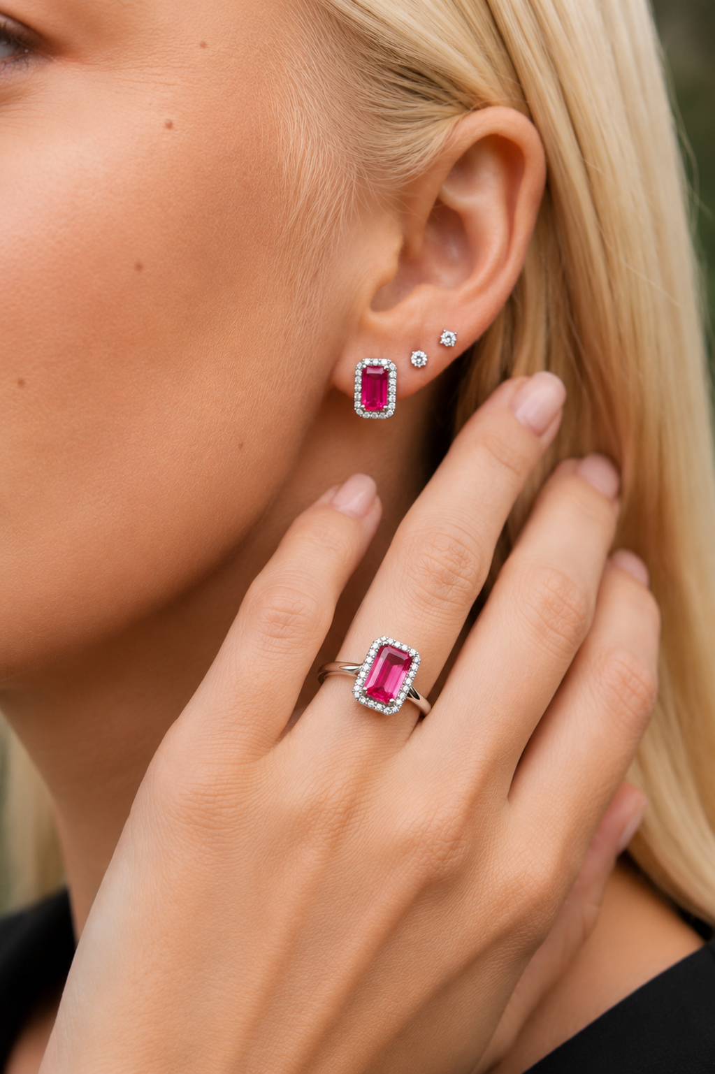 18ct white gold ring featuring a hot pink emerald-cut tourmaline with diamond halo surround.