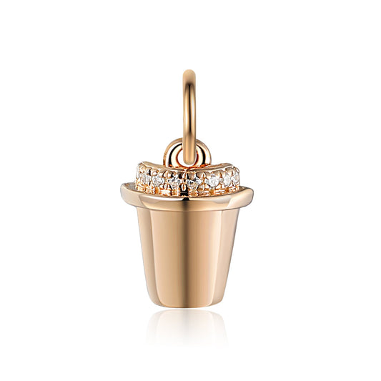 Gold coffee cup charm set with sparkling diamonds, suitable for a necklace or charm bracelet