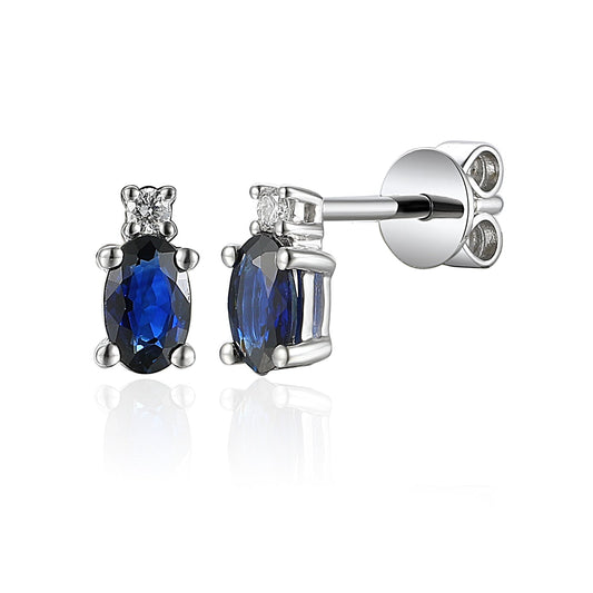 Elara 9ct white gold oval blue sapphire and diamond stud earrings with claw settings and butterfly backs.