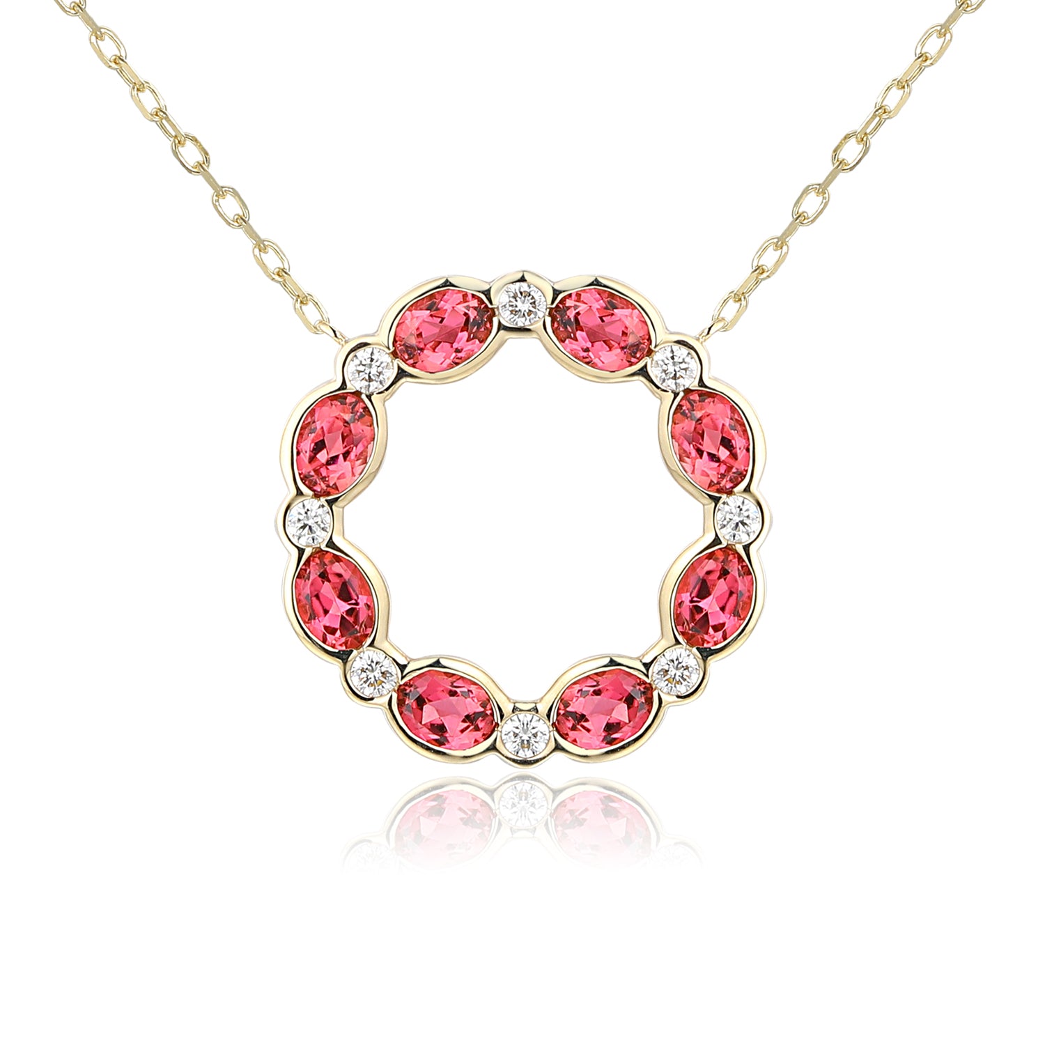 Oval pink tourmaline and diamond circle necklace in gold with natural pink gemstone and diamond surround.
