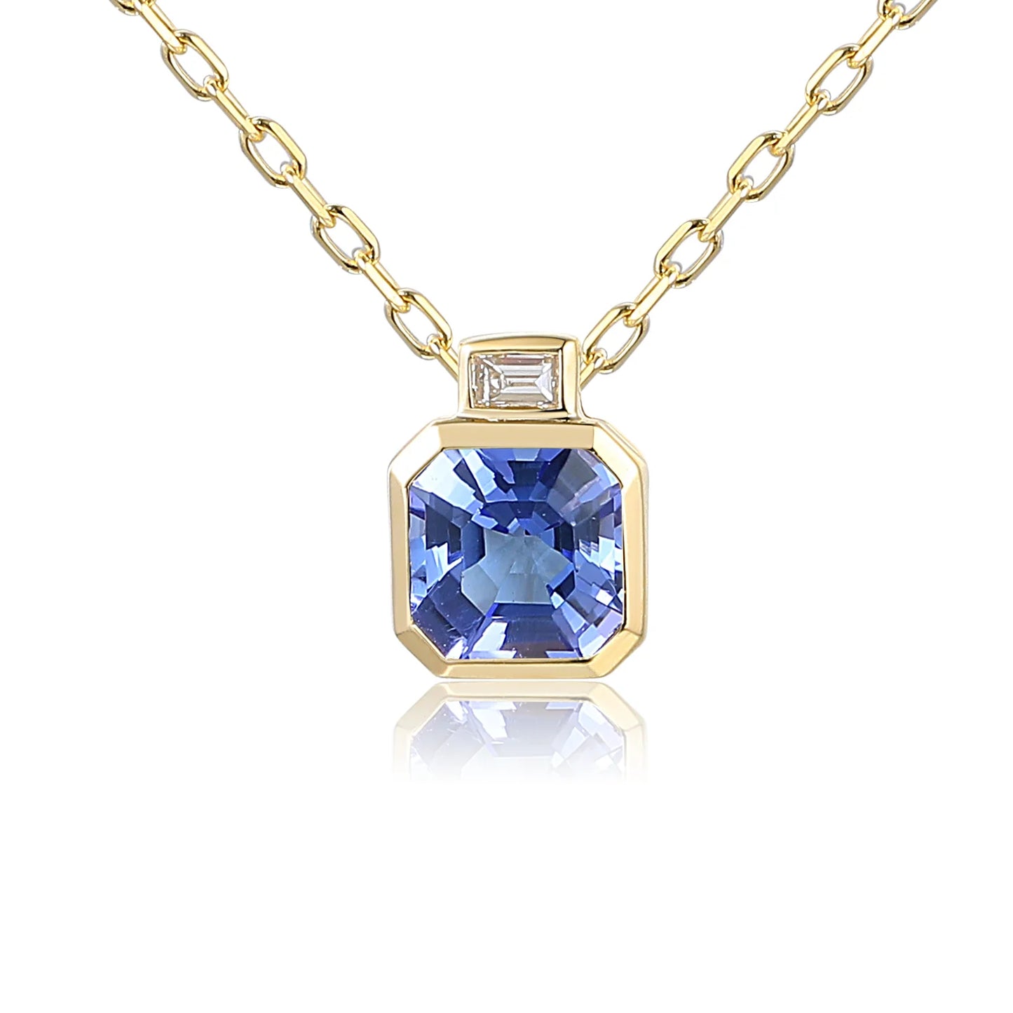 9ct yellow gold tanzanite necklace with emerald-cut diamond in rubover setting