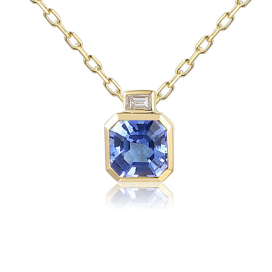9ct yellow gold tanzanite necklace with emerald-cut diamond in rubover setting