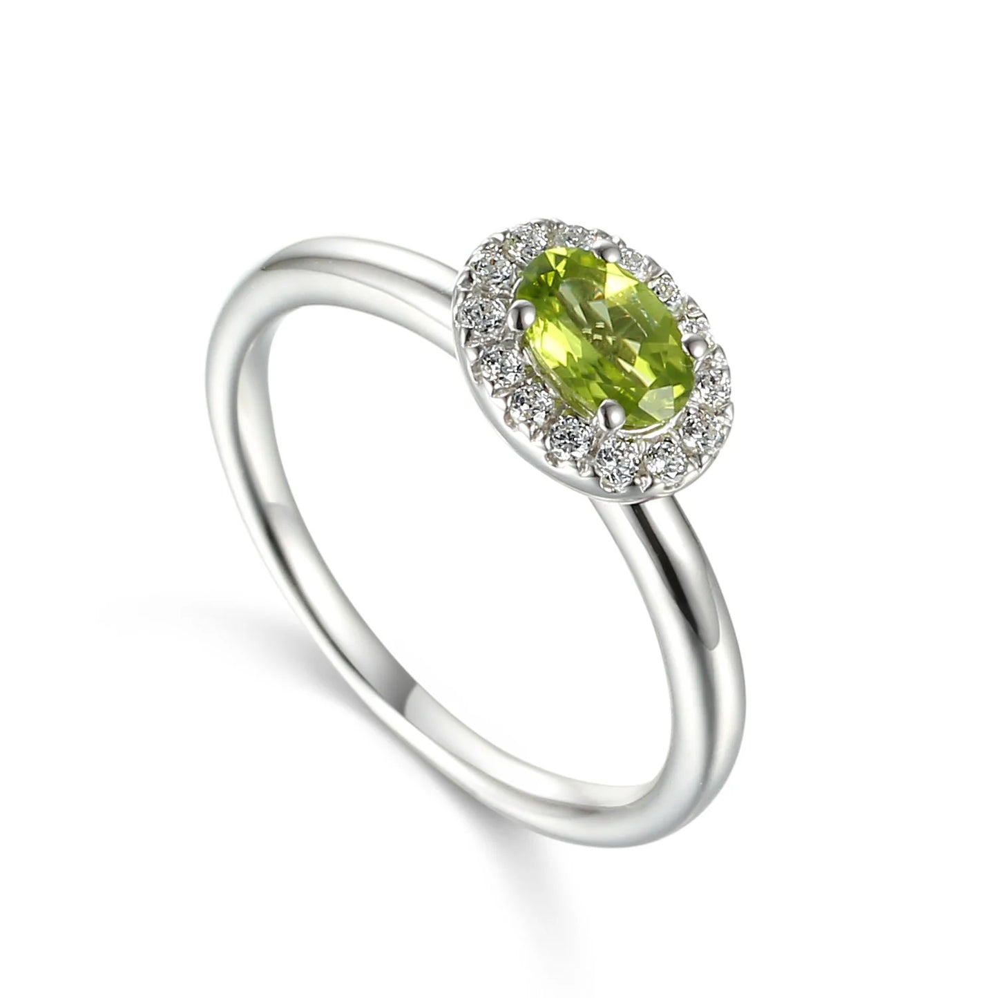 9ct white gold ring featuring a 5 × 4mm oval cut natural peridot surrounded by a sparkling diamond cluster