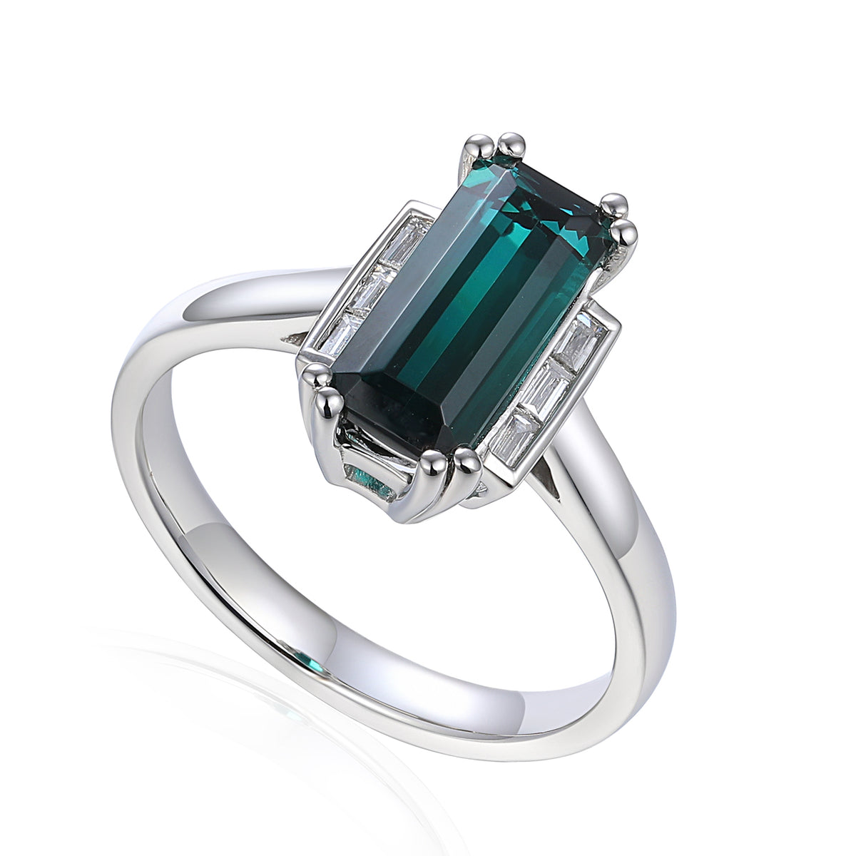 Emerald-cut green Tourmaline and baguette diamond ring in platinum