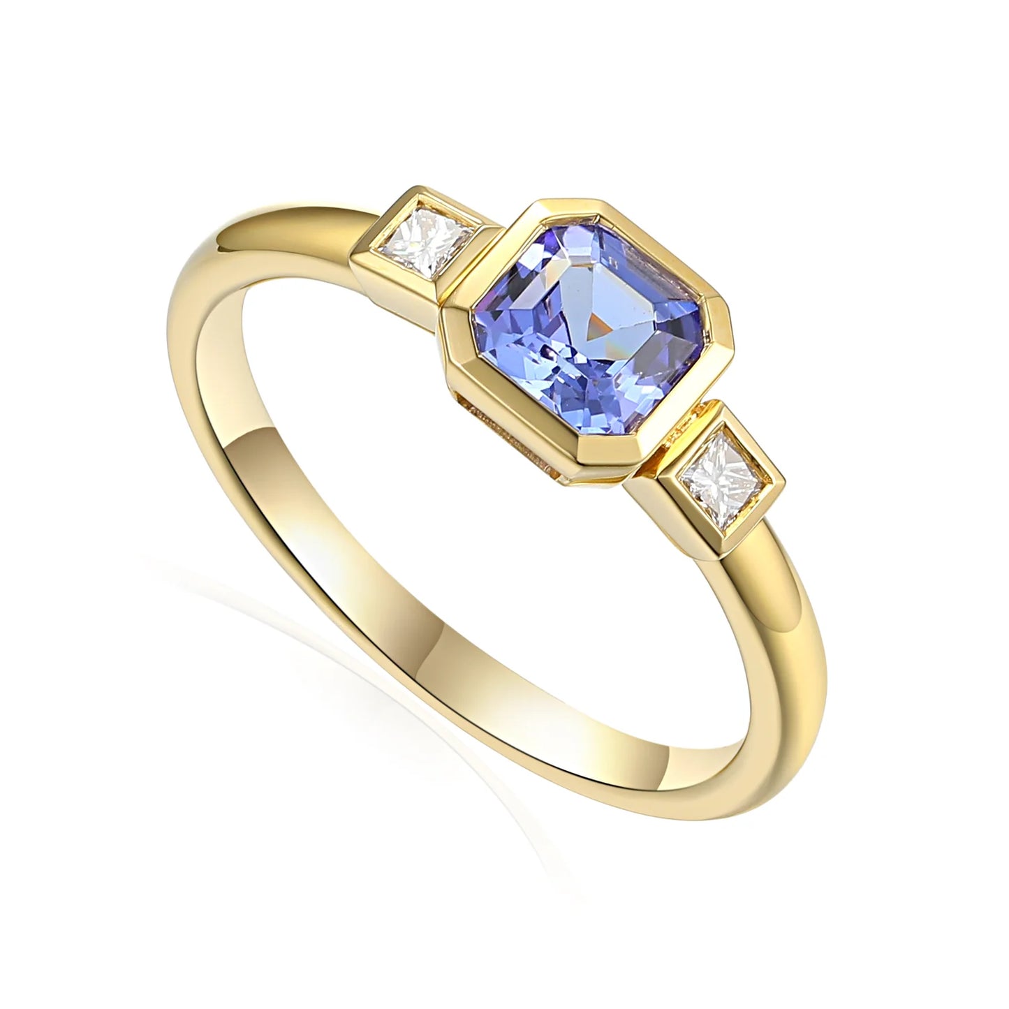 9ct yellow gold tanzanite ring with baguette diamonds and rubover setting