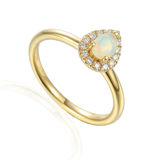 Pear-shaped Opal and diamond cluster ring in yellow gold