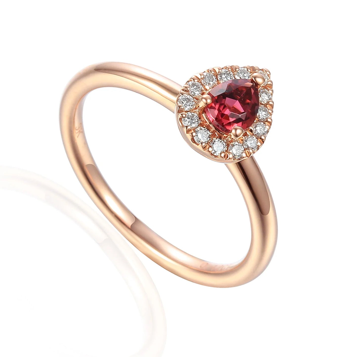 Pear shaped pink tourmaline and diamond cluster ring in rose gold