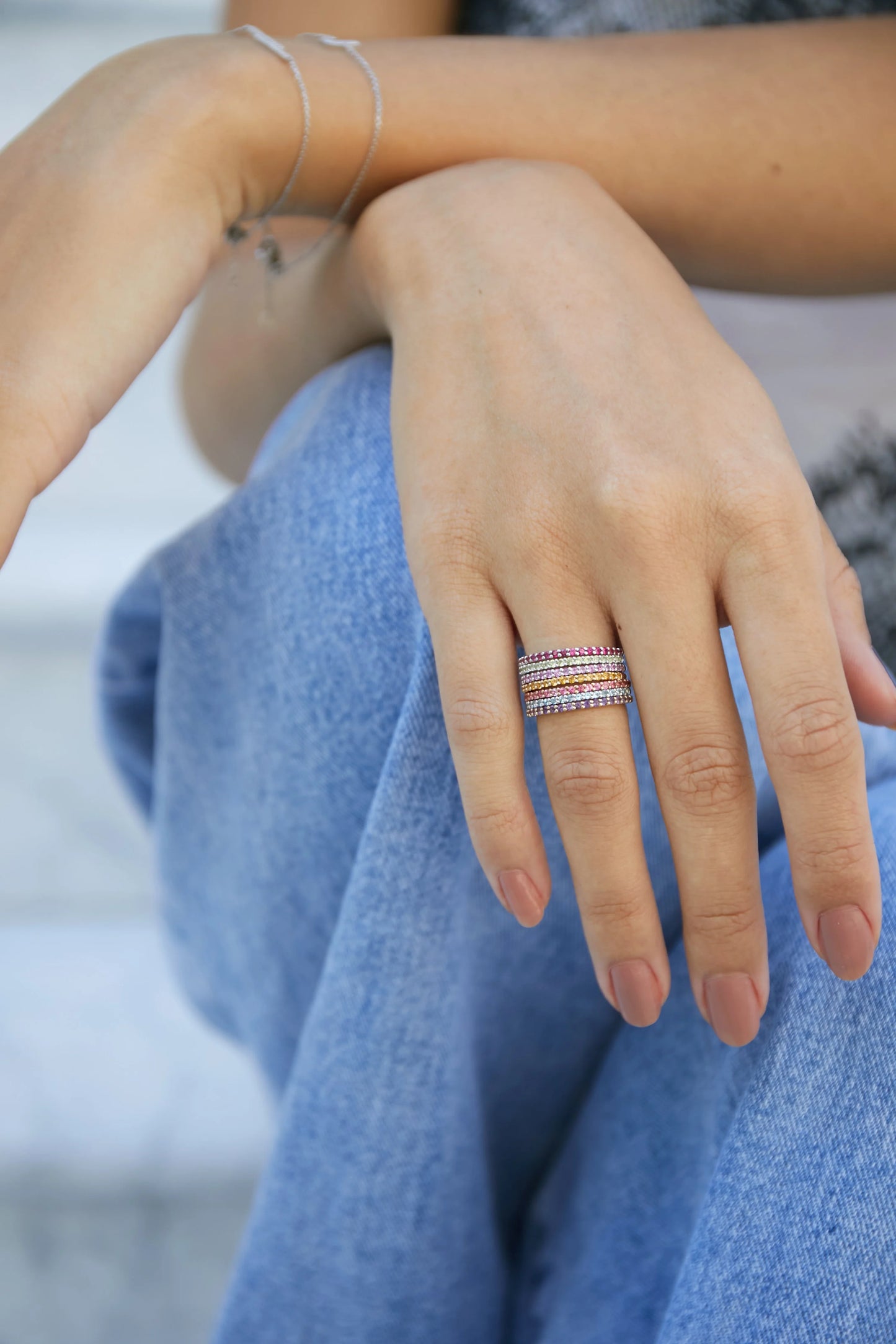 9ct yellow gold stackable eternity ring featuring a row of natural claw set peridot gemstones