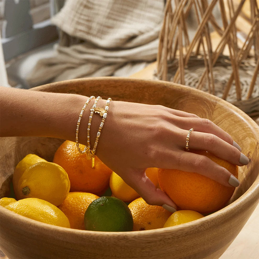 ChloBo Mixed Metal Twisted Oval Bracelet with sterling silver oval beads and gold-plated detailing