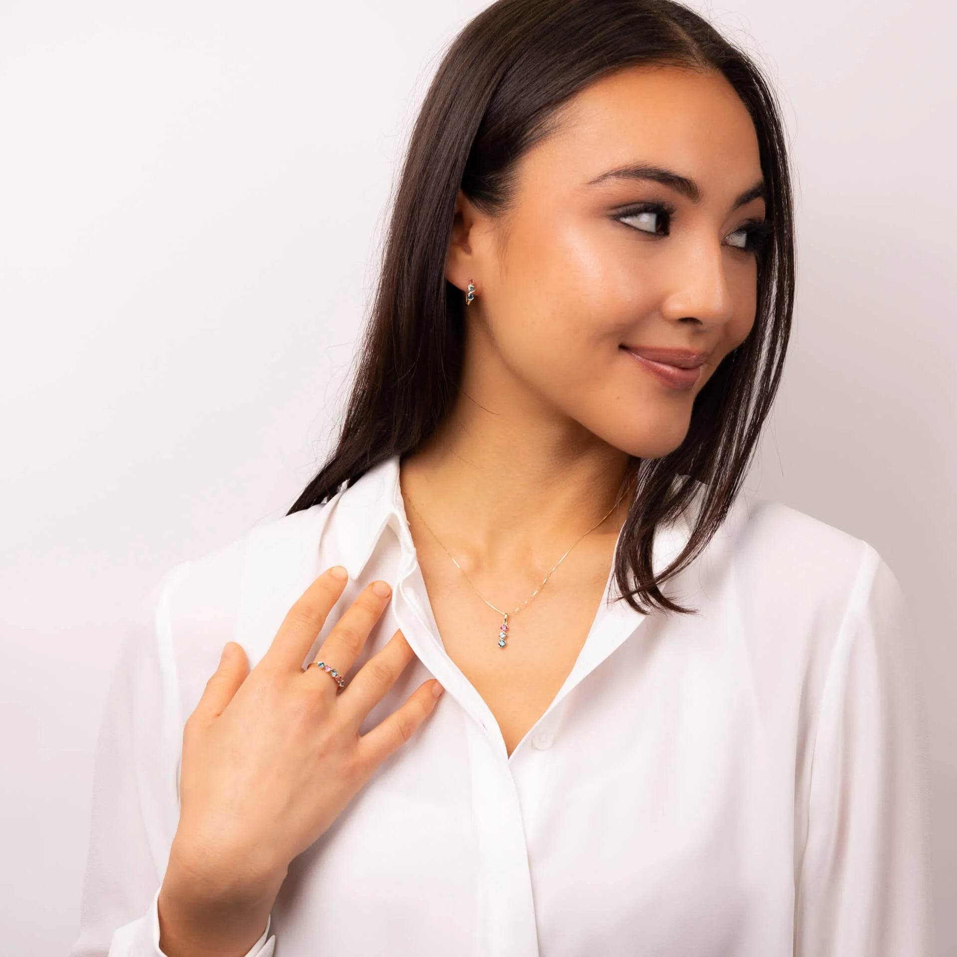 9ct yellow gold Amalfi pendant with natural green sapphire, pink tourmaline and London blue topaz. Includes an adjustable 16–18 inch chain.