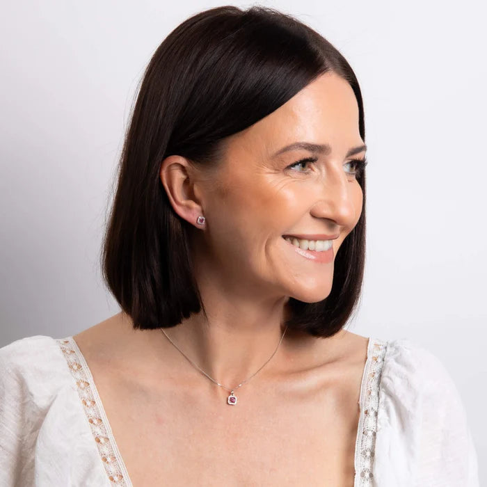 Ruby and diamond halo necklace by Marcus Tempus