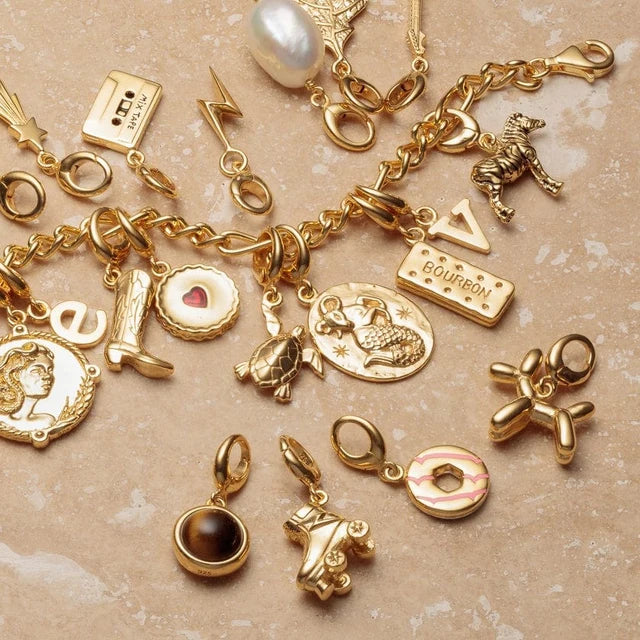 Lily Charmed gold balloon dog charm in 18ct gold-plated recycled sterling silver charm variety 
