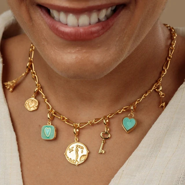 Gold My Story charm collector necklace by Lily Charmed in 18ct gold plated sterling silver on the model
