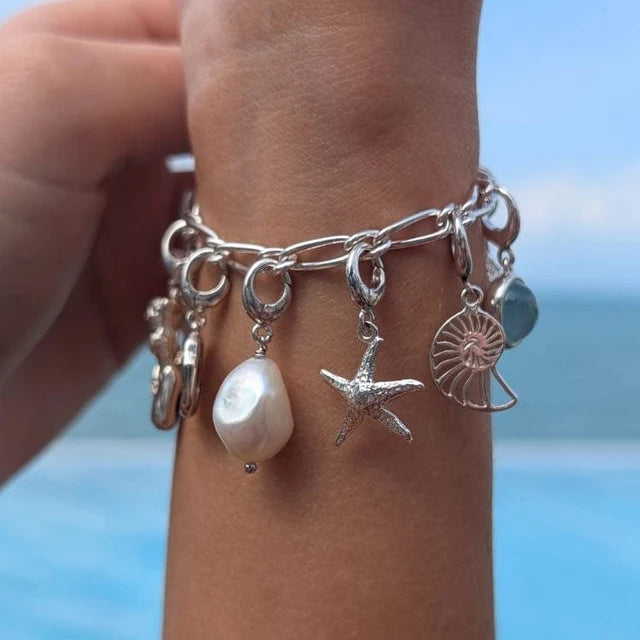 Lily Charmed Silver My Story Charm Collector Bracelet in rhodium-plated recycled sterling silver with charms