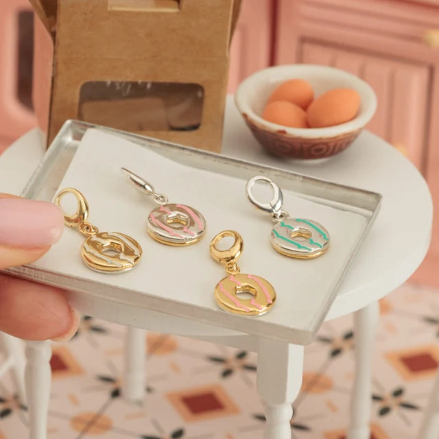 Lily Charmed gold Party Ring biscuit charm with pink enamel in 18ct gold-plated sterling silver baking tray