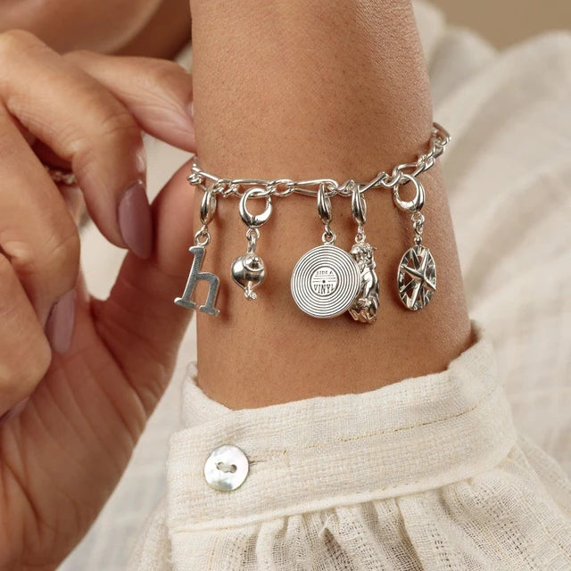 Lily Charmed Silver My Story Charm Collector Bracelet in rhodium-plated recycled sterling silver with charms